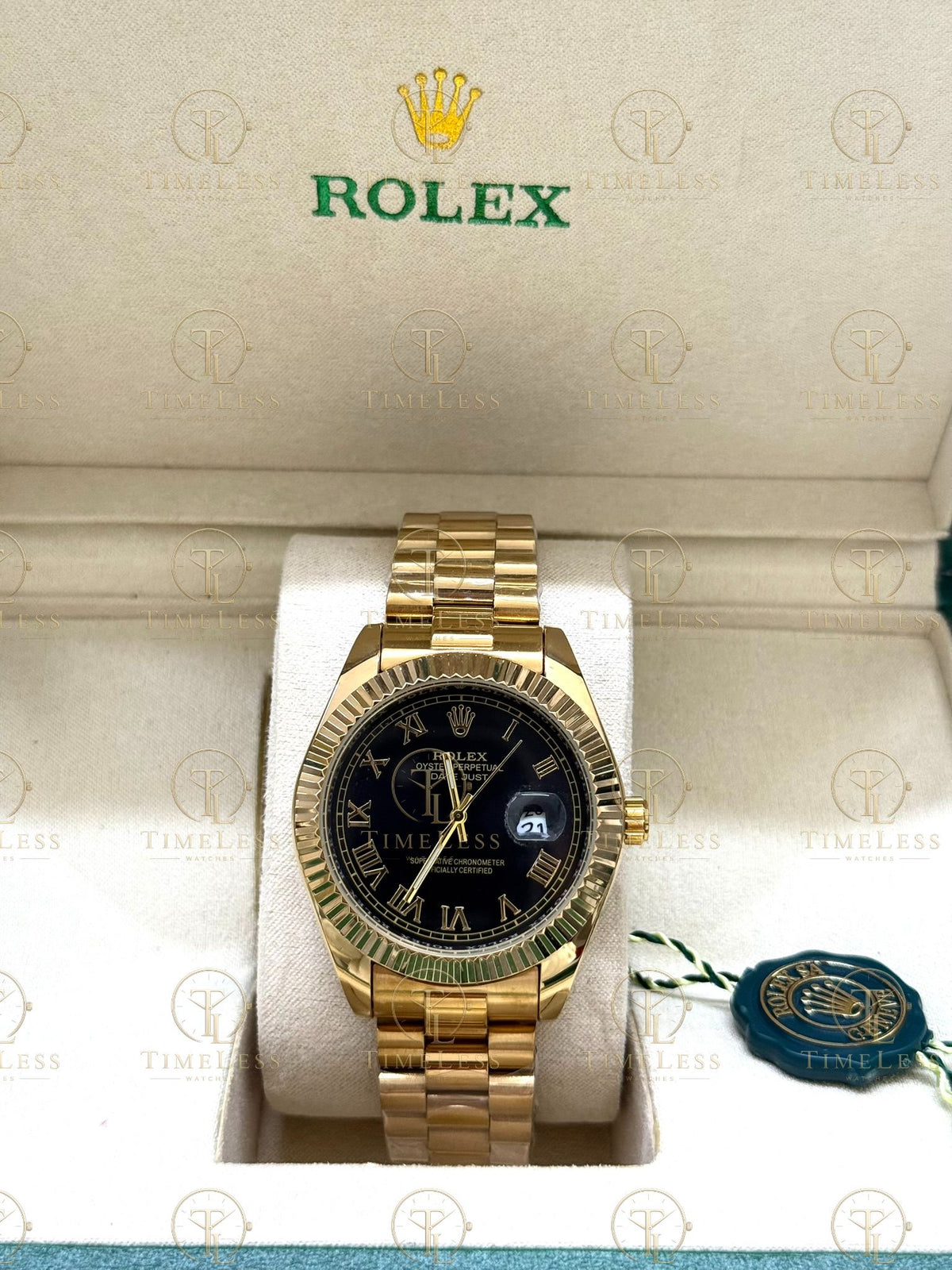 DATE JUST gold , black roman dial , president bracelet