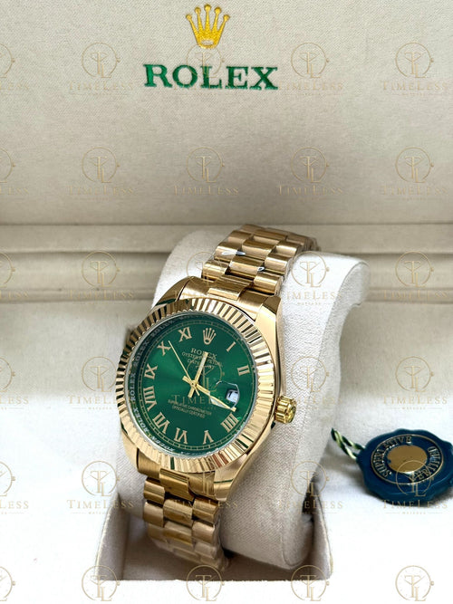 DATE JUST gold , green roman dial , president bracelet